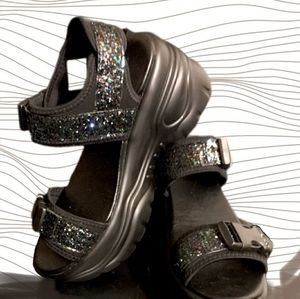 YRU Oracle Sandals. blk.